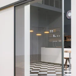 Ramowy system przesuwny Vetro Frame - drzwi szklane z rama aluminiowa